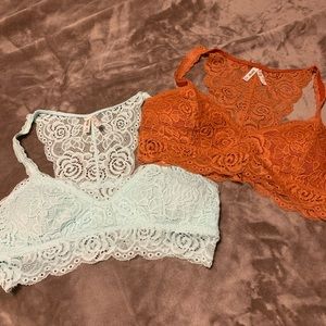 Set of 4 lace bralettes.